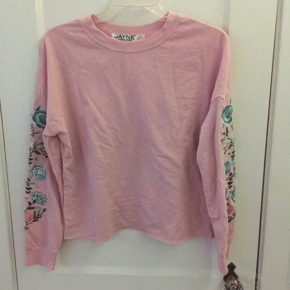 Long sleeve embroidered top.